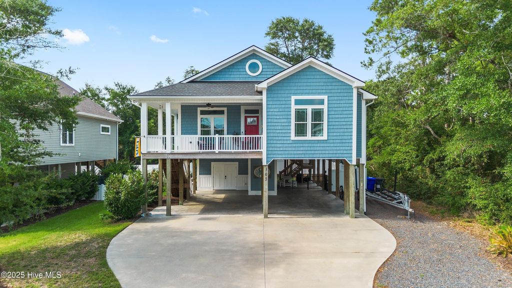 Photo of 305 E Yacht Drive, Oak Island, NC 28465 (MLS # 100522519)