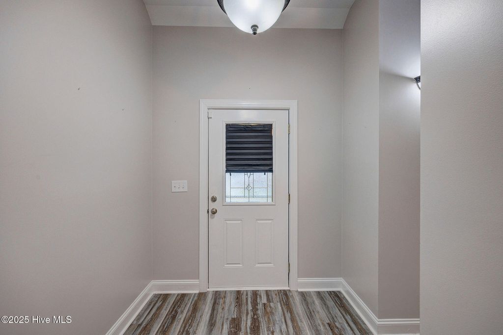 Photo of 399 Castle Bay Drive #D, Hampstead, NC 28443 (MLS # 100524701)