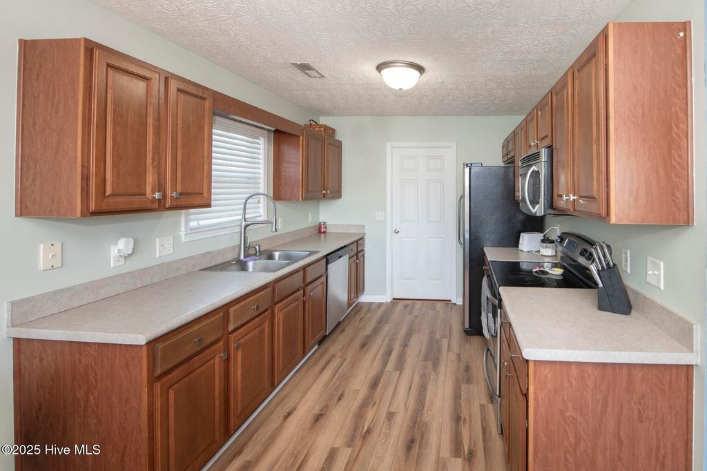 Photo of 236 Red Carnation Drive, Holly Ridge, NC 28445 (MLS # 100541598)