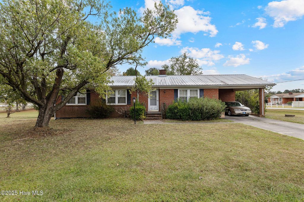 Photo of 5824 Wayne Memorial Drive NE, Pikeville, NC 27863 (MLS # 100537452)