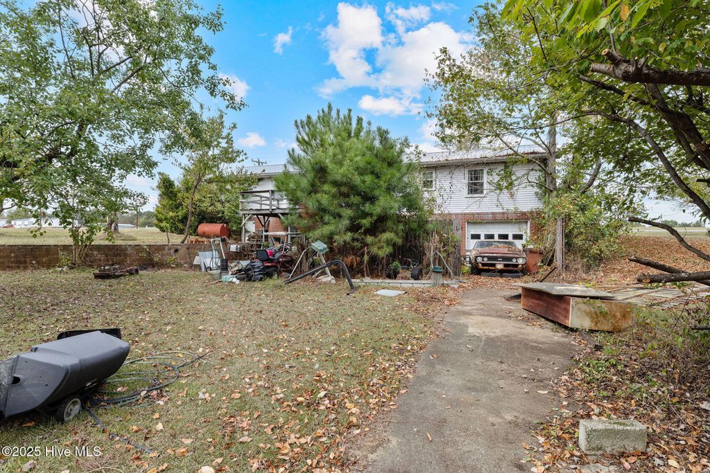 Photo of 5824 Wayne Memorial Drive NE, Pikeville, NC 27863 (MLS # 100537452)