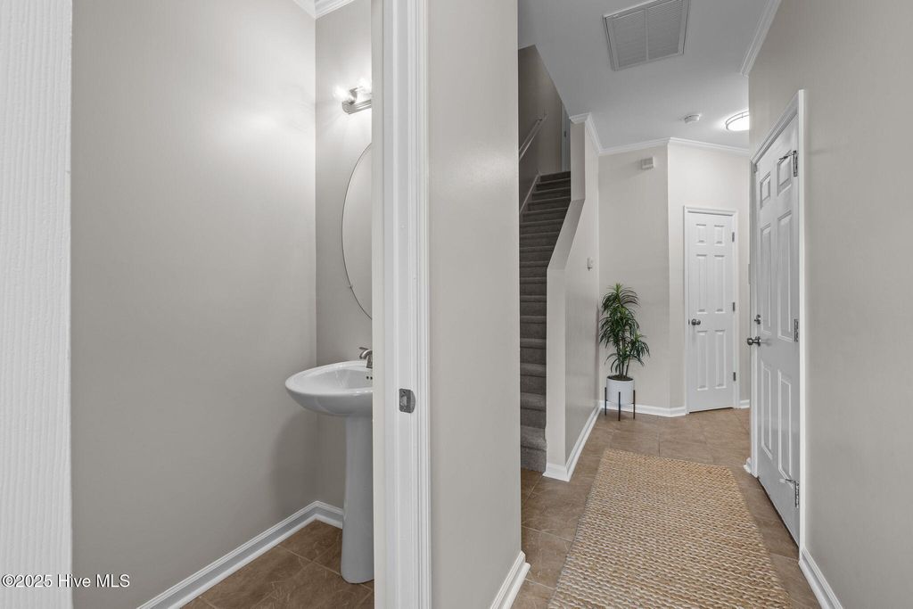 Photo of 304 Cedar Island Trail, Holly Ridge, NC 28445 (MLS # 100515586)