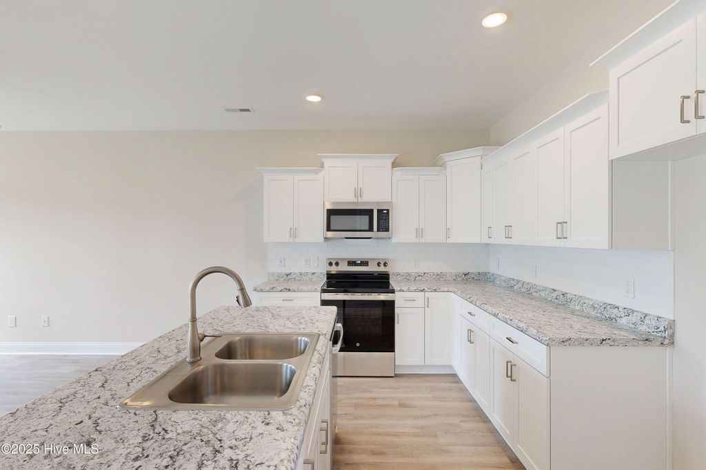 Photo of 207 Sandpiper Place, Holly Ridge, NC 28445 (MLS # 100493008)