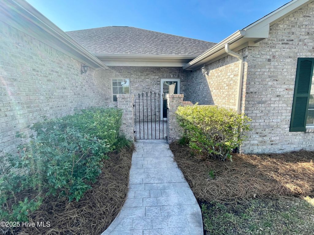 Photo of 607 Castle Bay Drive, Hampstead, NC 28443 (MLS # 100504816)