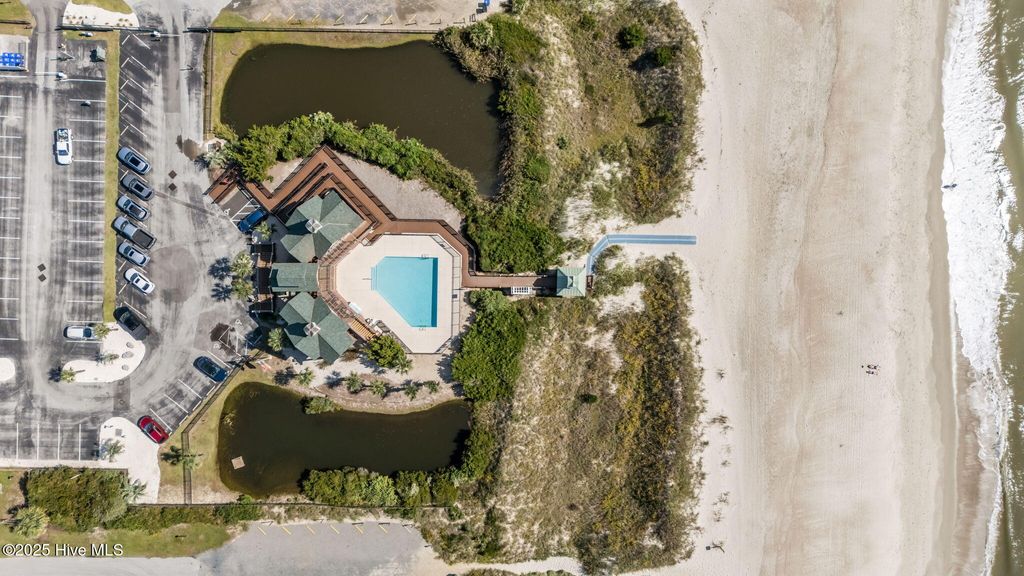 Photo of 112 SE 71st Street, Oak Island, NC 28465 (MLS # 100536844)
