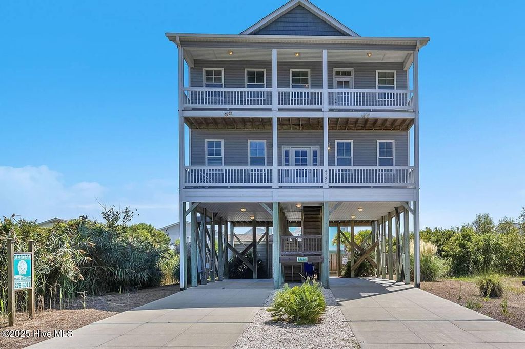 Photo of 4325 E Pelican Drive, Oak Island, NC 28465 (MLS # 100543948)
