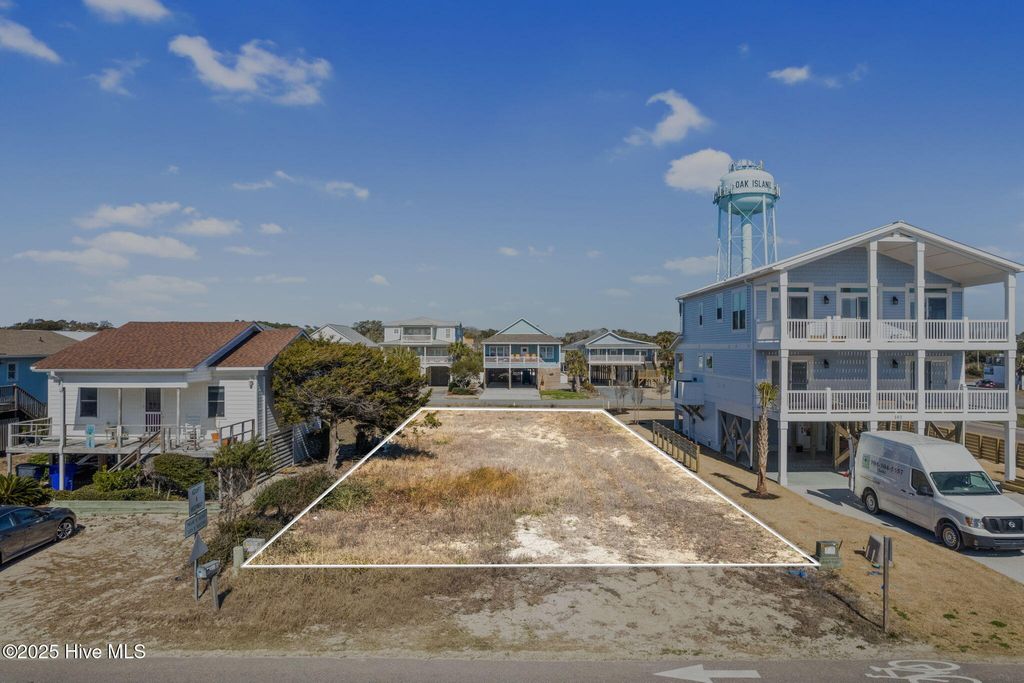 Photo of 104 W Beach Drive, Oak Island, NC 28465 (MLS # 100538194)