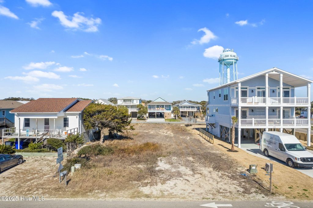 Photo of 104 W Beach Drive, Oak Island, NC 28465 (MLS # 100538194)