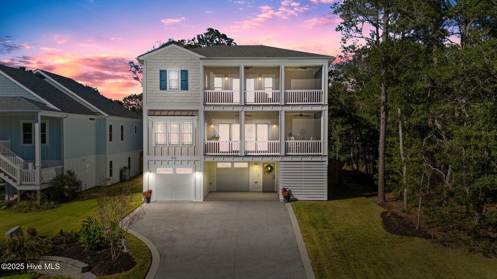 Photo of 111 SW 22nd Street, Oak Island, NC 28465 (MLS # 100539028)