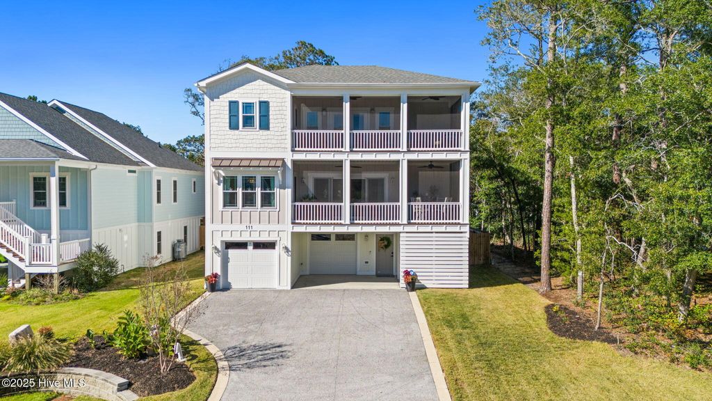 Photo of 111 SW 22nd Street, Oak Island, NC 28465 (MLS # 100539028)