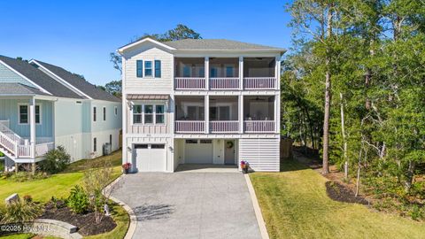 Photo of 111 SW 22nd Street, Oak Island, NC 28465 (MLS # 100539028)