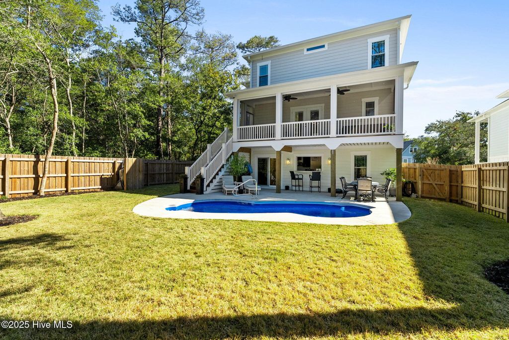 Photo of 111 SW 22nd Street, Oak Island, NC 28465 (MLS # 100539028)