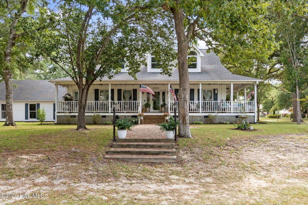 Photo of 801 E Yacht Drive, Oak Island, NC 28465 (MLS # 100529306)