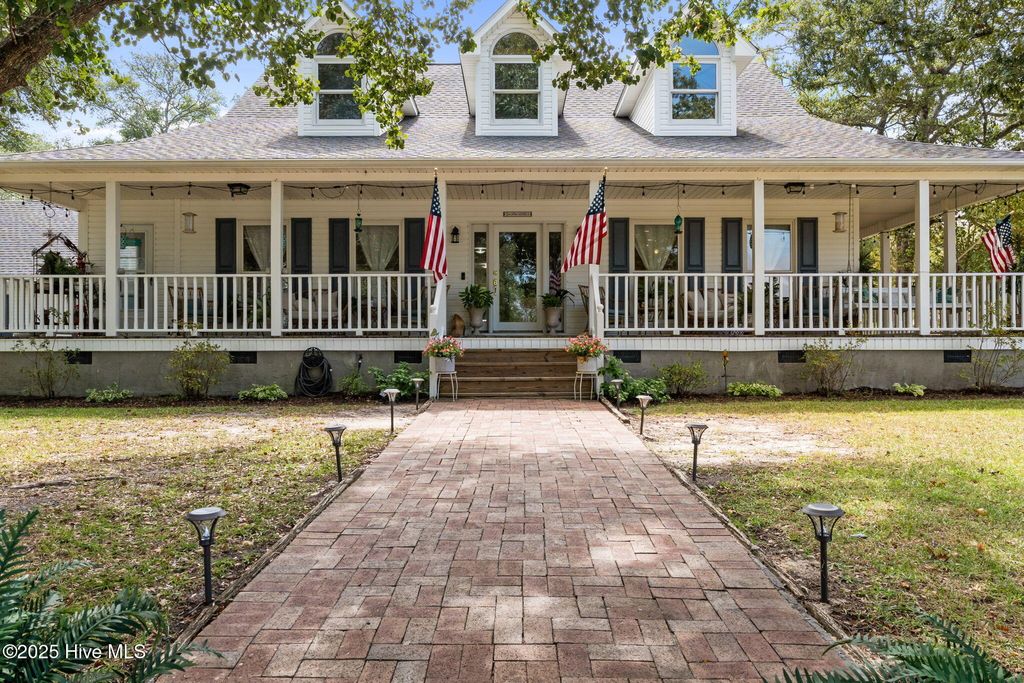 Photo of 801 E Yacht Drive, Oak Island, NC 28465 (MLS # 100529306)