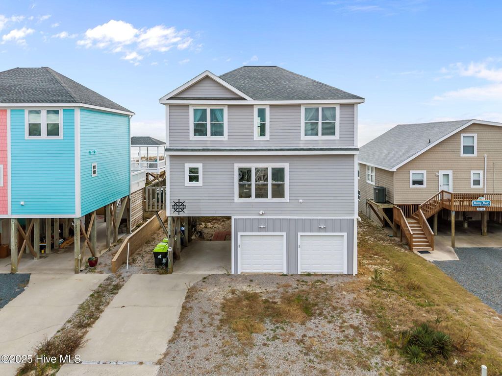 Photo of 2227 E Beach Drive, Oak Island, NC 28465 (MLS # 100544258)