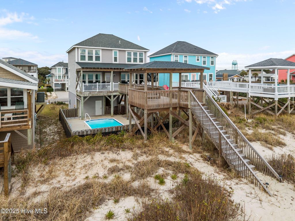 Photo of 2227 E Beach Drive, Oak Island, NC 28465 (MLS # 100544258)