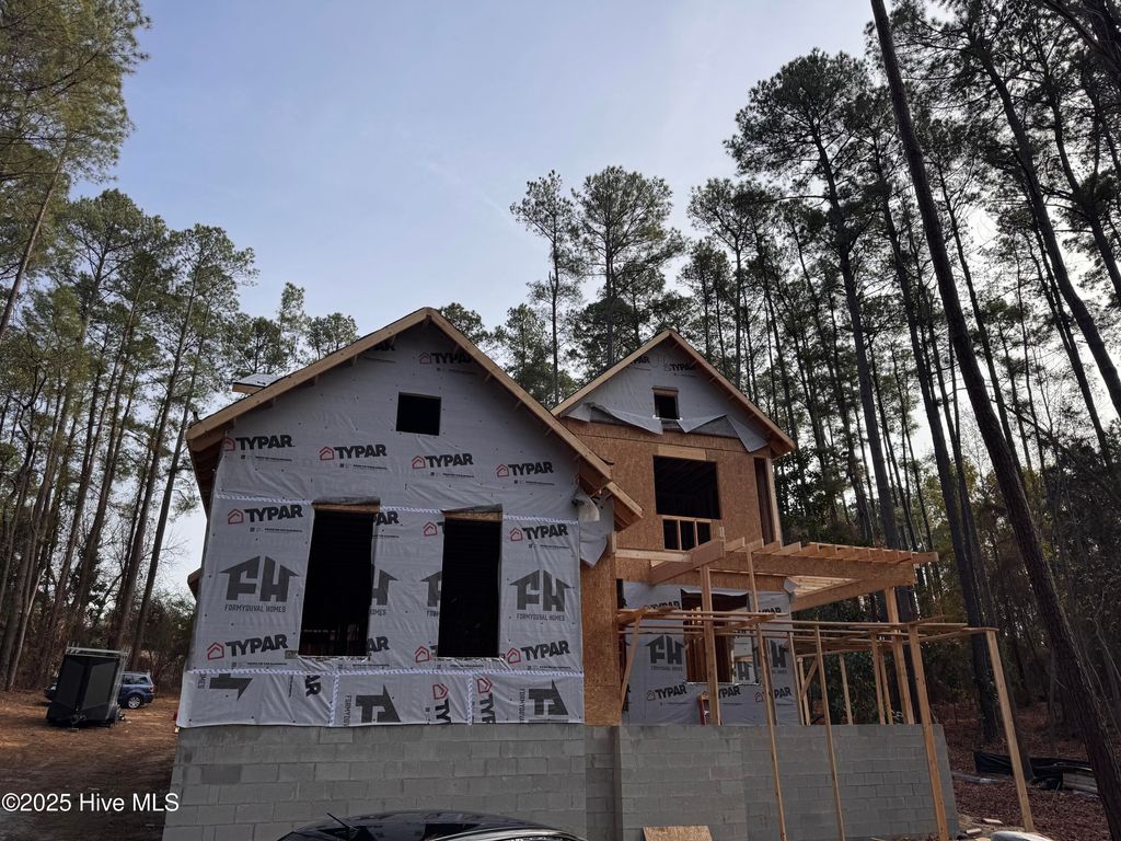 Photo of 13 Pine Lake Drive, Whispering Pines, NC 28327 (MLS # 100526005)