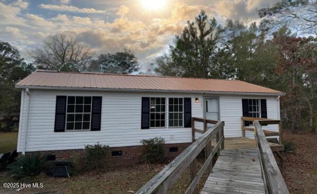 Photo of 529 Red Fox Street NW, Shallotte, NC 28470 (MLS # 100543471)