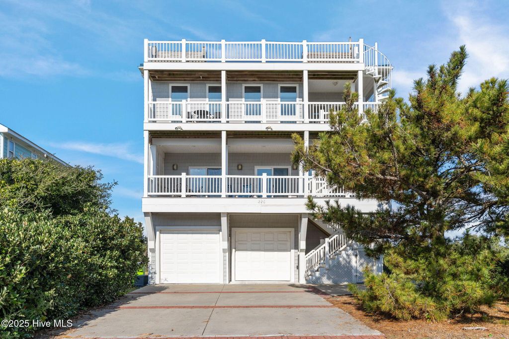 Photo of 220 Caswell Beach Road, Oak Island, NC 28465 (MLS # 100544368)