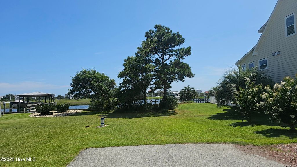 Photo of 108 SW 22nd Street, Oak Island, NC 28465 (MLS # 100514199)