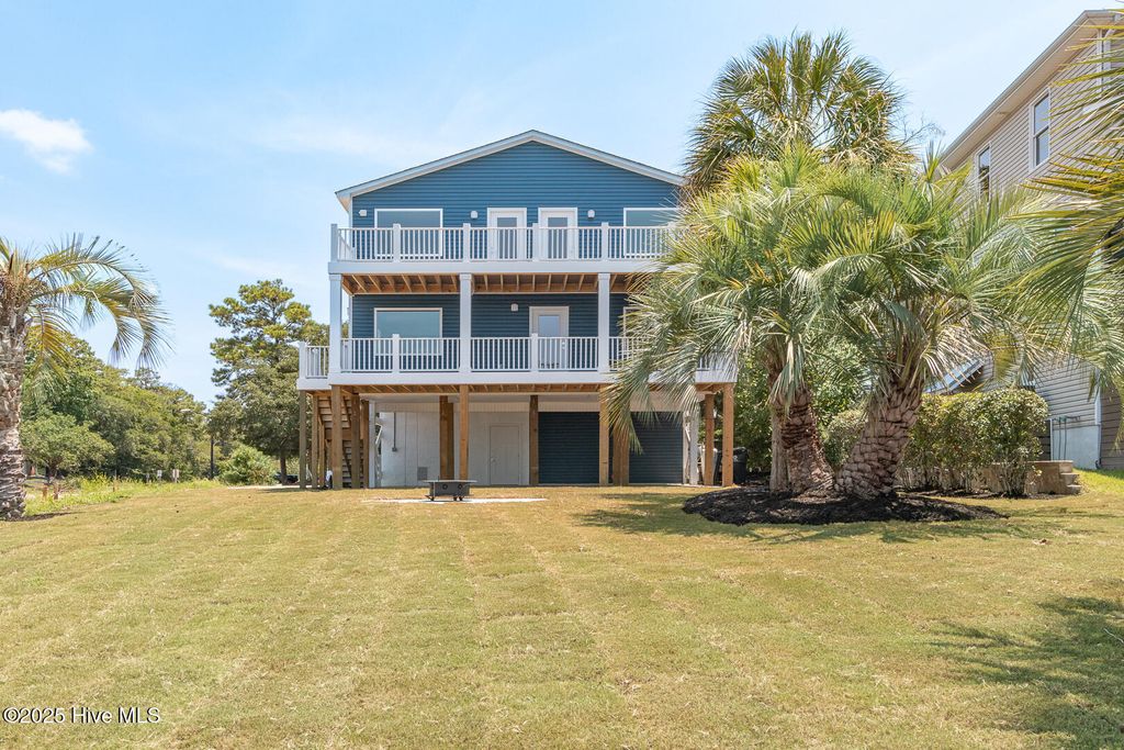 Photo of 102 SW Yacht Drive, Oak Island, NC 28465 (MLS # 100521409)