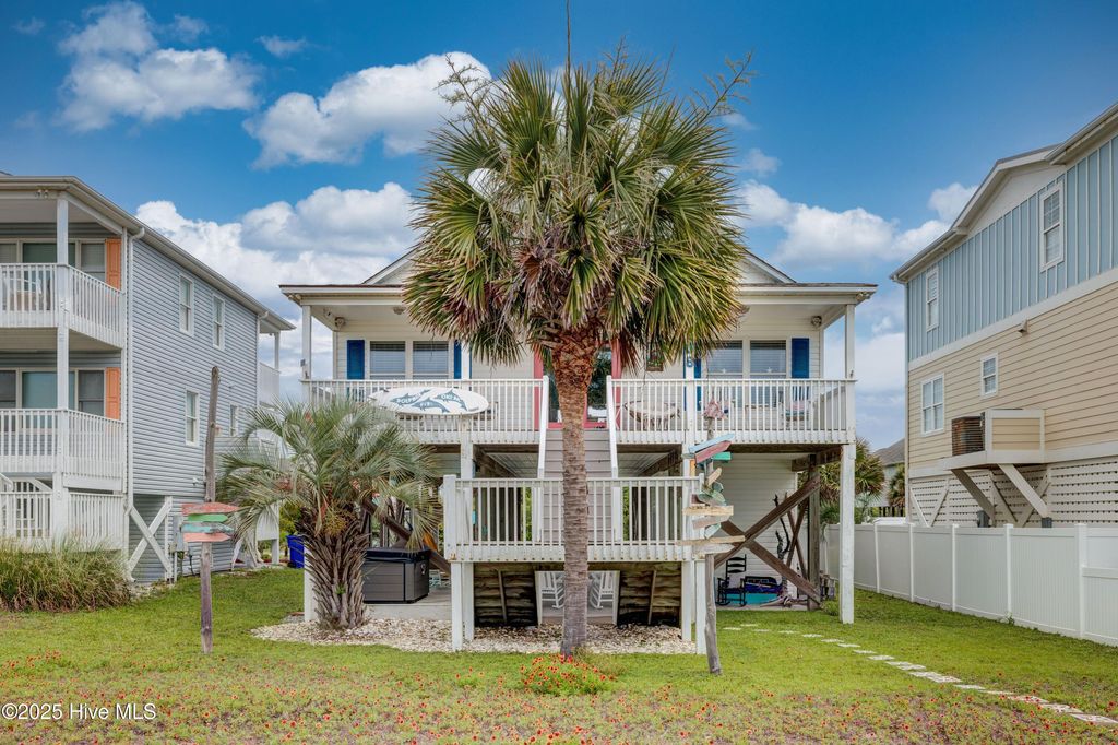 Photo of 108 W Dolphin Drive, Oak Island, NC 28465 (MLS # 100511998)
