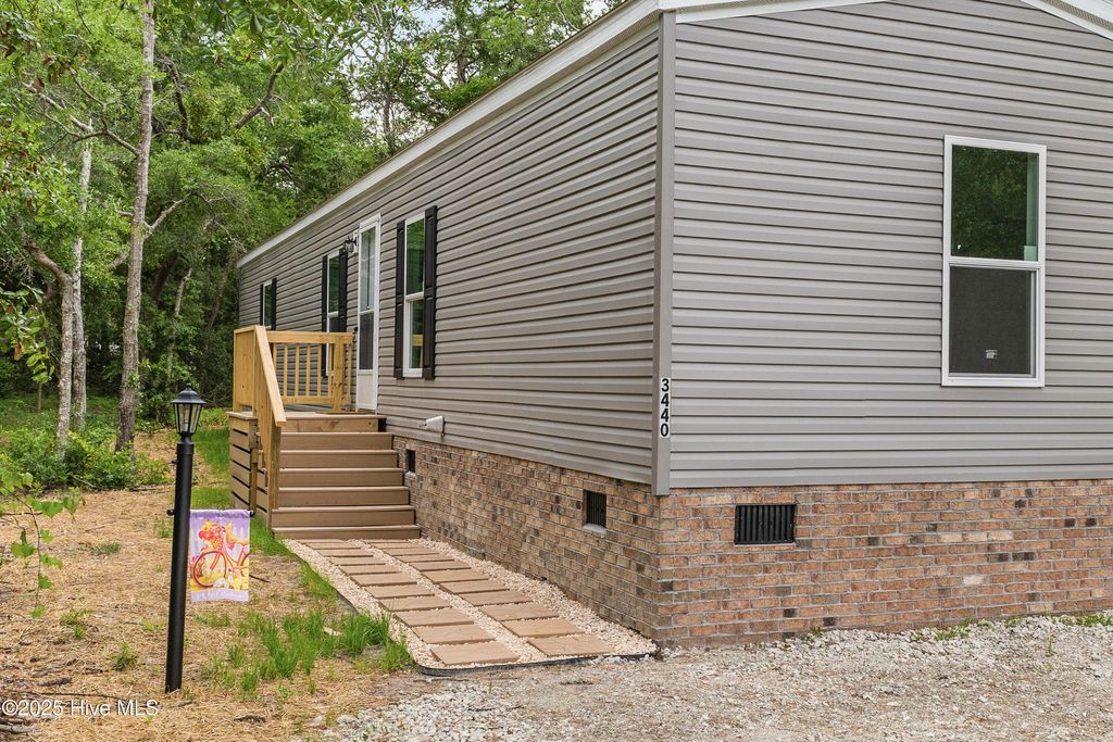 Photo of 3440 Dolphin Drive, Bolivia, NC 28422 (MLS # 100441695)