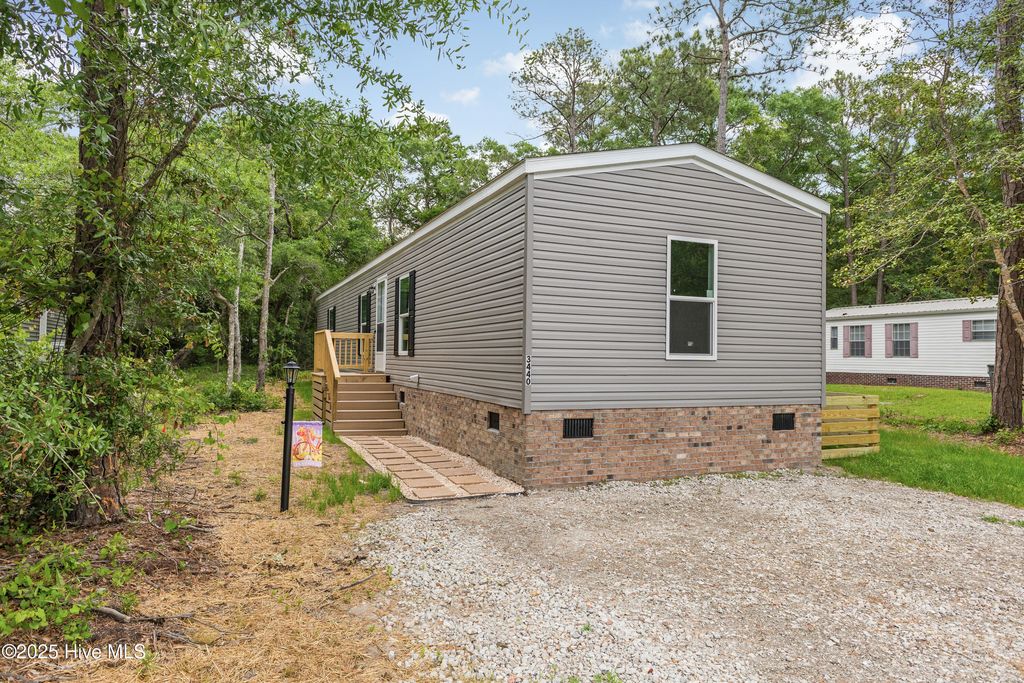 Photo of 3440 Dolphin Drive, Bolivia, NC 28422 (MLS # 100441695)