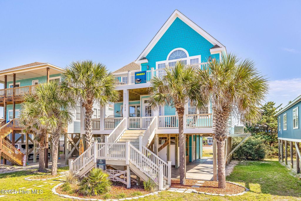 Photo of 308 E Beach Drive, Oak Island, NC 28465 (MLS # 100509917)