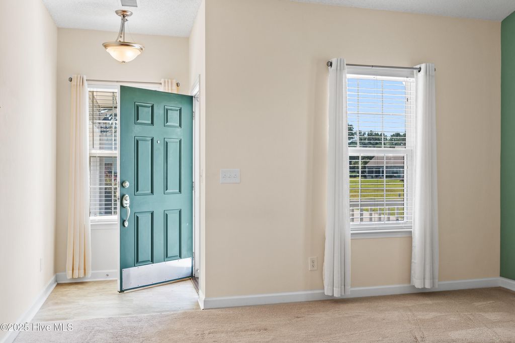 Photo of 1015 Coleto Creek Lane, Carolina Shores, NC 28467 (MLS # 100529501)