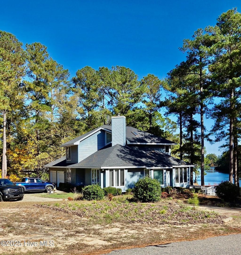 Photo of 30081 W Lake Drive, Wagram, NC 28396 (MLS # 100539040)