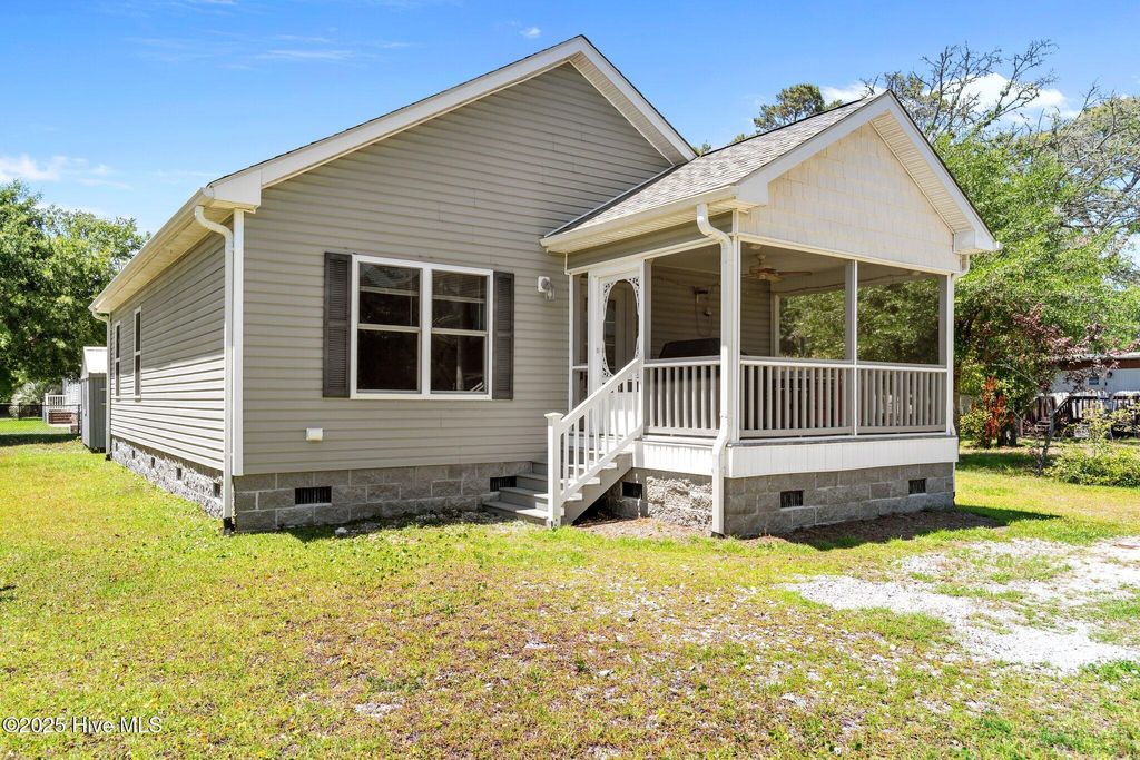 Photo of 233 NE 70th Street, Oak Island, NC 28465 (MLS # 100509442)