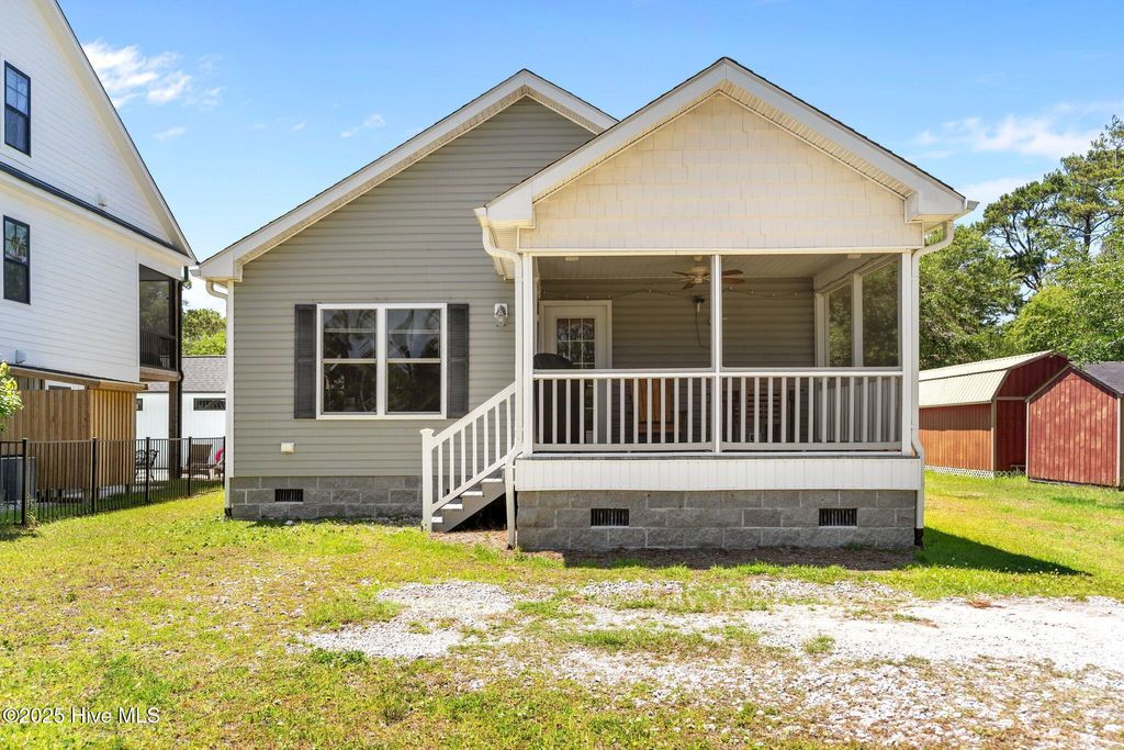 Photo of 233 NE 70th Street, Oak Island, NC 28465 (MLS # 100509442)