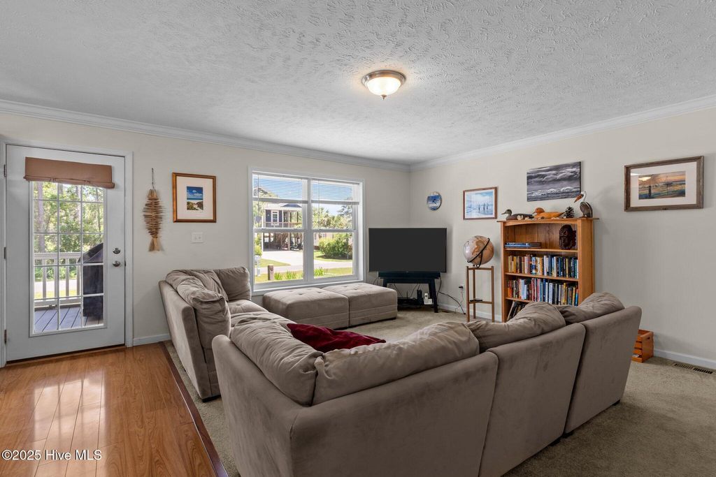 Photo of 233 NE 70th Street, Oak Island, NC 28465 (MLS # 100509442)