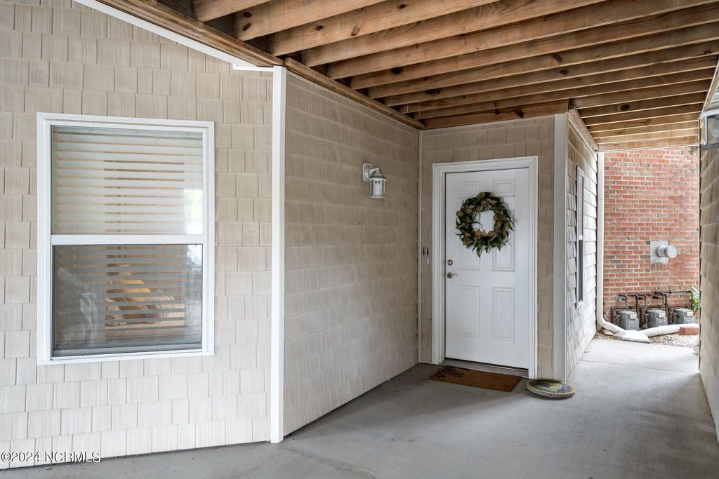 Photo of 625 Spencer Farlow Drive #11, Carolina Beach, NC 28428 (MLS # 100537994)