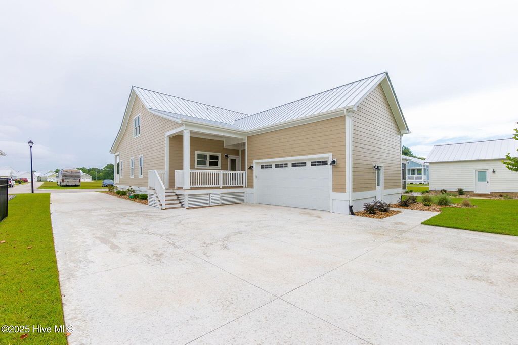 Photo of 203 Villagers Way, Swansboro, NC 28584 (MLS # 100475941)