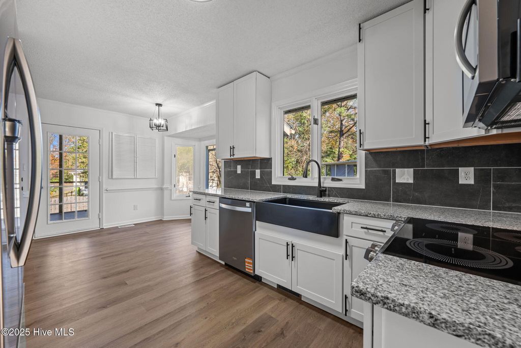 Photo of 309 Channel Run Drive, New Bern, NC 28562 (MLS # 100541222)