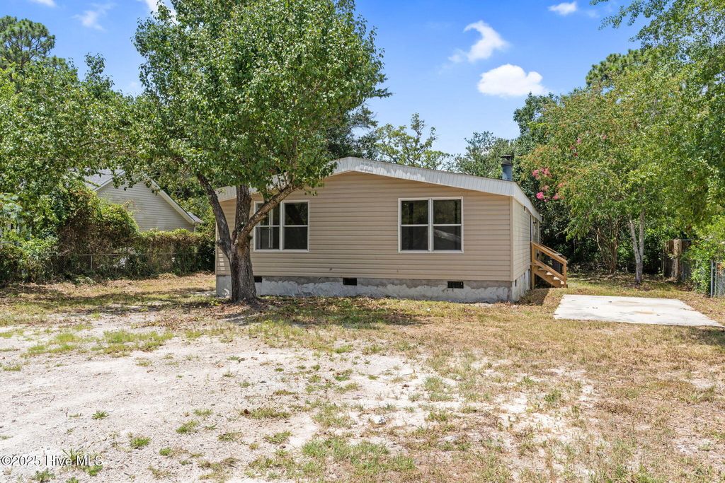 Photo of 1070 Pinecrest Road, Southport, NC 28461 (MLS # 100514432)