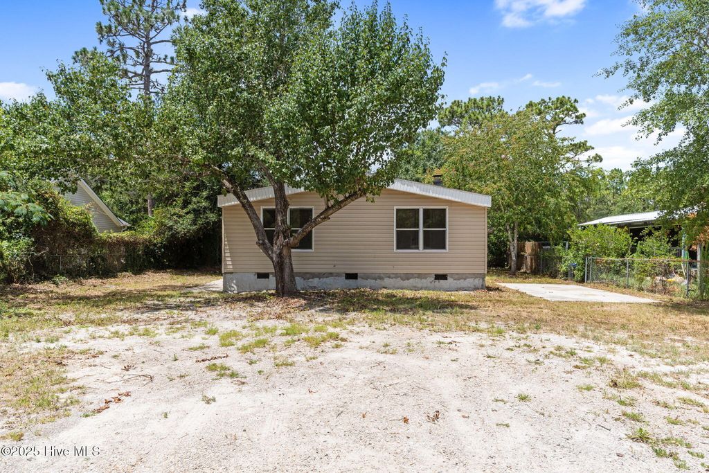 Photo of 1070 Pinecrest Road, Southport, NC 28461 (MLS # 100514432)