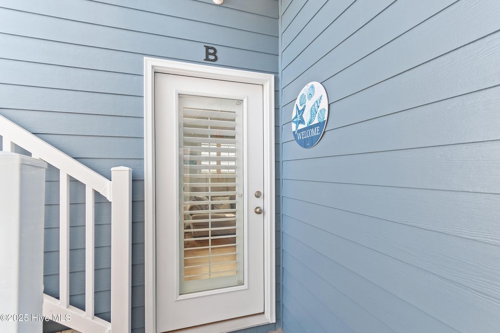 Photo of 413 27th Street # B, Sunset Beach, NC 28468 (MLS # 100543636)