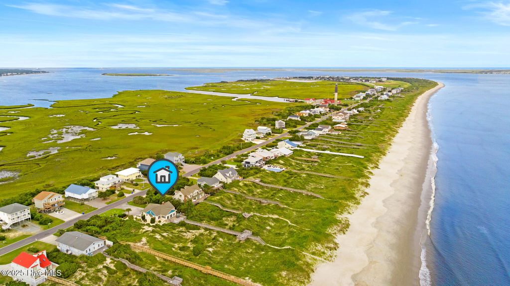 Photo of 419 Caswell Beach Road, Oak Island, NC 28465 (MLS # 100531510)