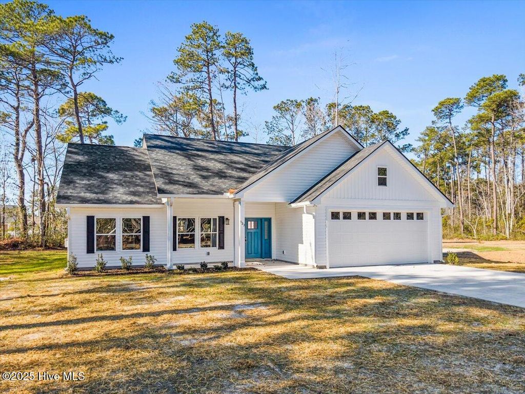 Photo of 523 Leatherwood Drive NW, Carolina Shores, NC 28467 (MLS # 100530553)