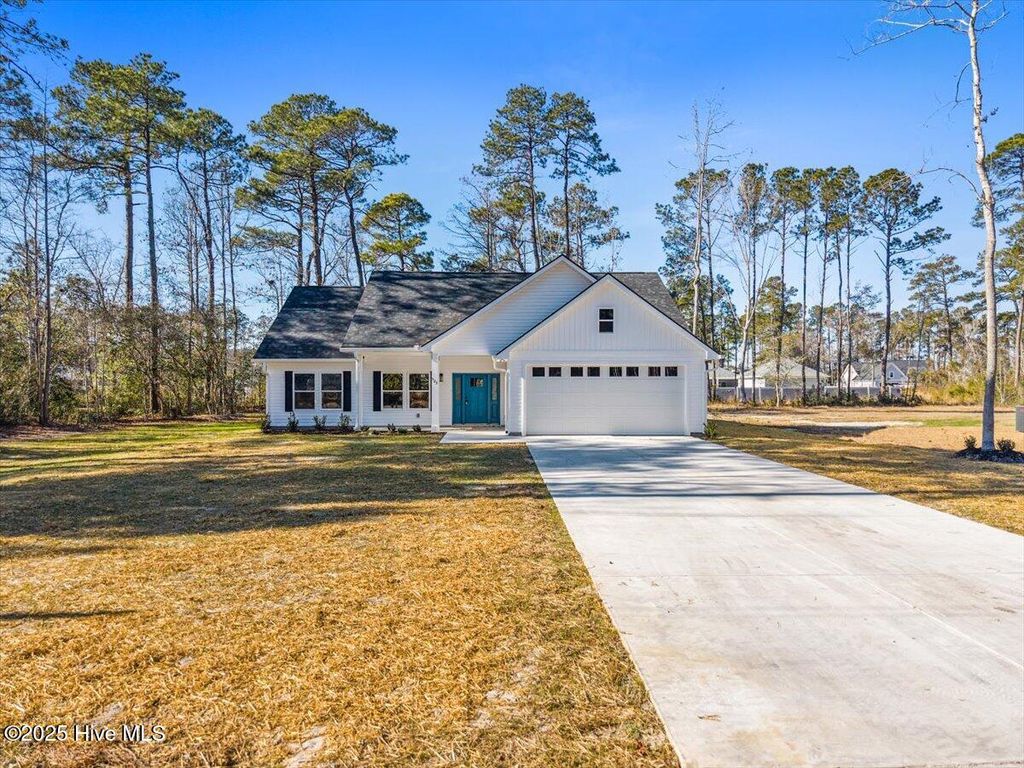 Photo of 523 Leatherwood Drive NW, Carolina Shores, NC 28467 (MLS # 100530553)