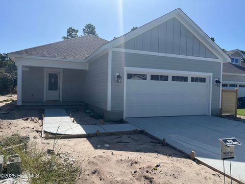 Photo of 2451 Lake Ridge Drive, Southport, NC 28461 (MLS # 100530312)