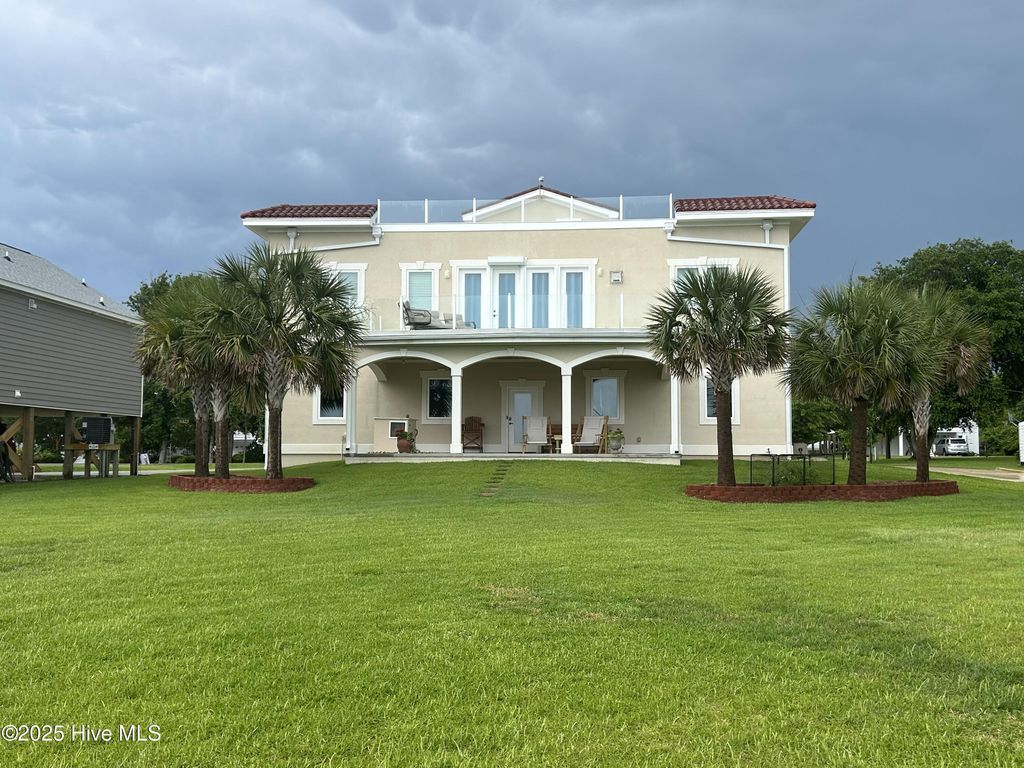 Photo of 1044 Mallard Bay Road, Hampstead, NC 28443 (MLS # 100497602)