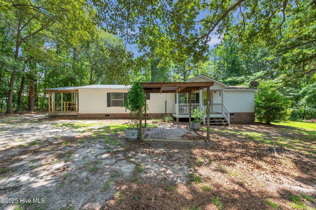 Photo of 2092 John Henry Store Road, Currie, NC 28435 (MLS # 100519368)