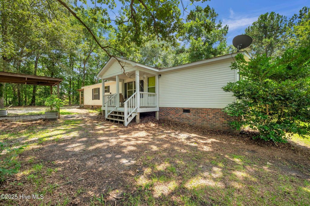 Photo of 2092 John Henry Store Road, Currie, NC 28435 (MLS # 100519368)