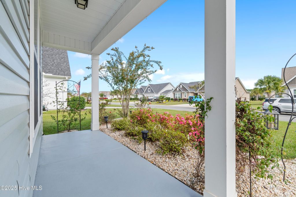 Photo of 703 E Chatman Drive NW, Calabash, NC 28467 (MLS # 100535730)