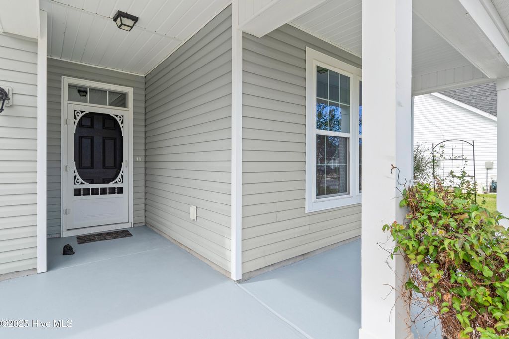 Photo of 703 E Chatman Drive NW, Calabash, NC 28467 (MLS # 100535730)