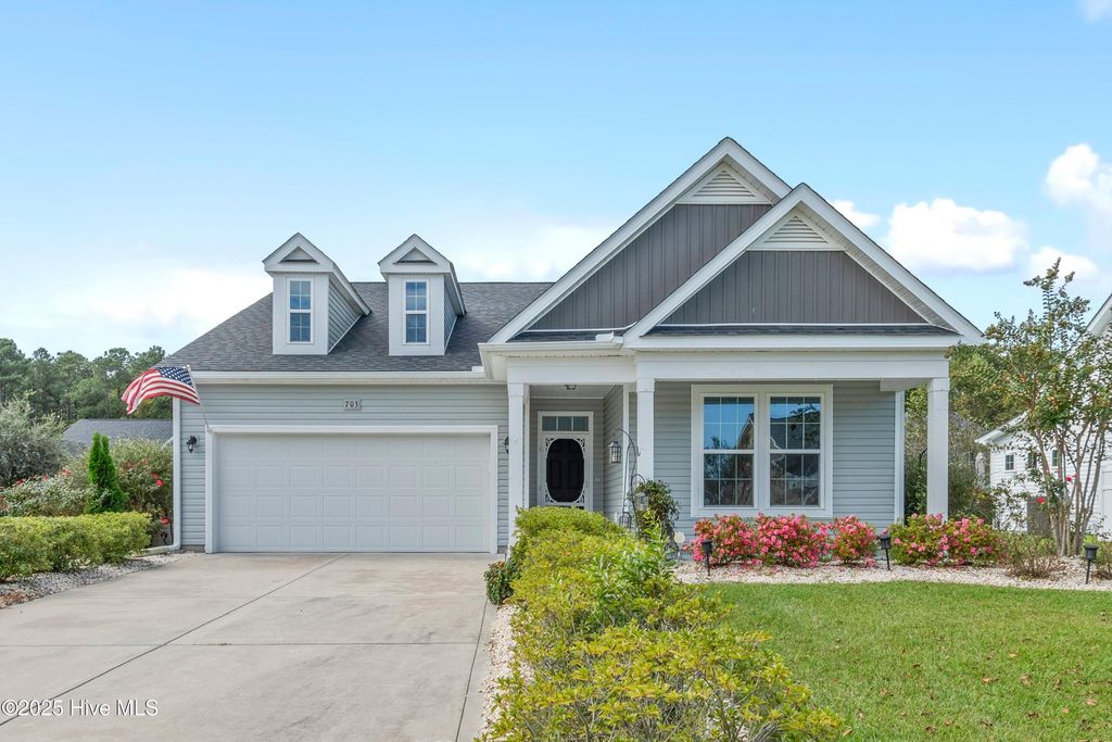 Photo of 703 E Chatman Drive NW, Calabash, NC 28467 (MLS # 100535730)